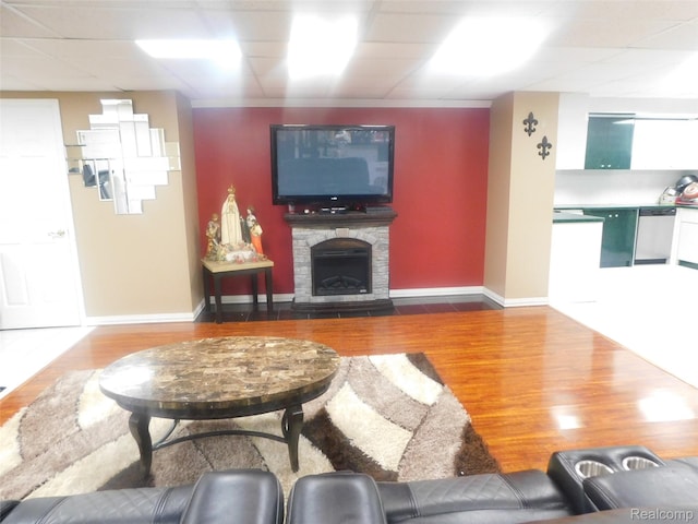 41431 Tarragon Dr, Sterling Heights, MI 48314 - living area featuring wood finished floors and a fireplace