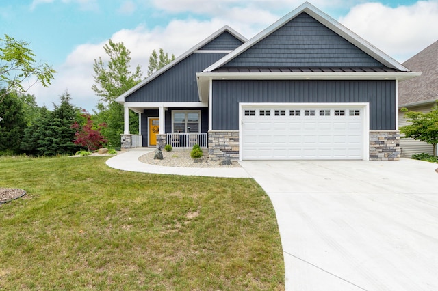 5332 Harborview Pass, Kalamazoo, MI 49009 - craftsman-style home featuring a standing seam roof, stone siding, an attached garage, driveway, and a metal roof