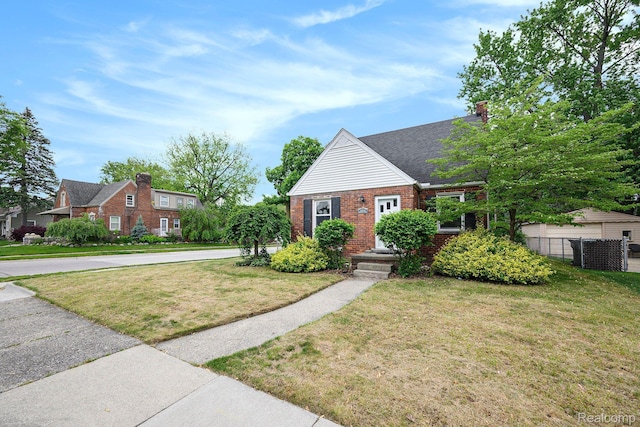 2856 Academy St, Dearborn, MI 48124 - view of front of property featuring brick siding and a shingled roof