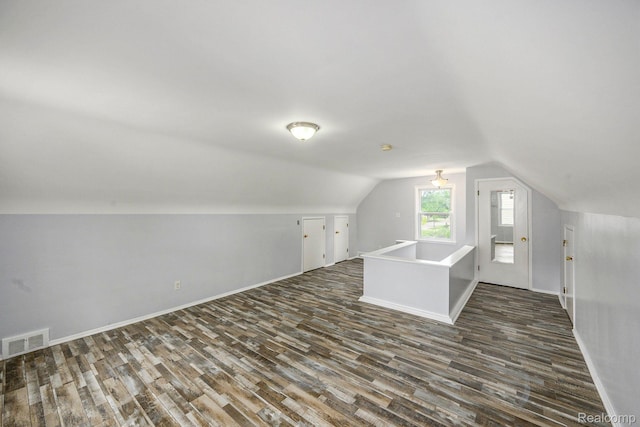 2856 Academy St, Dearborn, MI 48124 - bonus room featuring dark wood-style floors and lofted ceiling