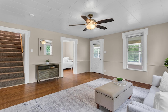123 Fairview St, Hanover, MI 49241 - living area featuring stairs, ceiling fan, and wood finished floors
