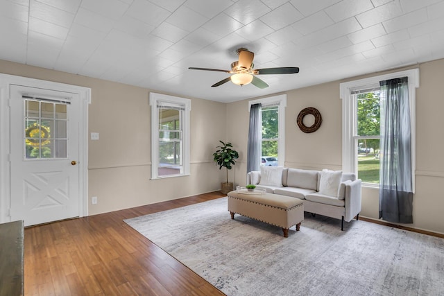 123 Fairview St, Hanover, MI 49241 - living area featuring wood finished floors and ceiling fan