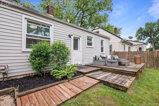 94 S Tilden Ave, Waterford, MI 48328 - wooden deck with an outdoor hangout area