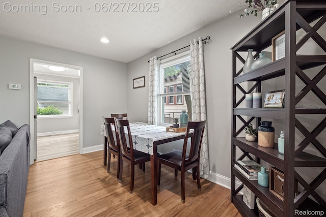 94 S Tilden Ave, Waterford, MI 48328 - dining area with light wood-style floors and recessed lighting