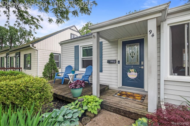 94 S Tilden Ave, Waterford, MI 48328 - doorway to property featuring a wooden deck