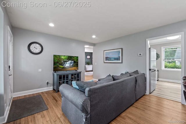94 S Tilden Ave, Waterford, MI 48328 - living area featuring light wood-style floors and recessed lighting
