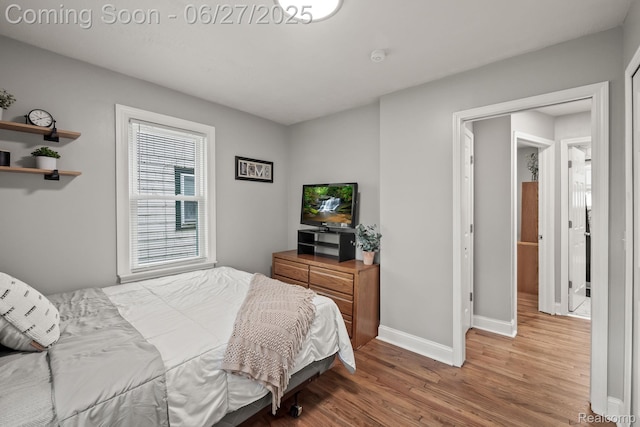 94 S Tilden Ave, Waterford, MI 48328 - bedroom with wood finished floors and baseboards