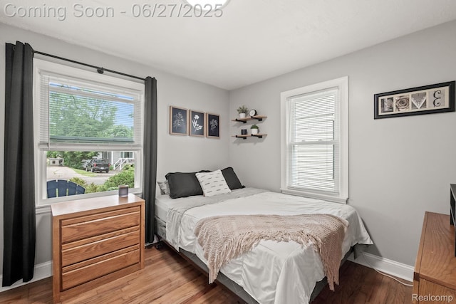 94 S Tilden Ave, Waterford, MI 48328 - bedroom featuring wood finished floors and baseboards