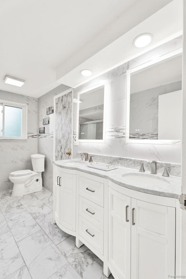 14717 Dane Ct, Sterling Heights, MI 48312 - bathroom featuring marble look tile flooring and double vanity