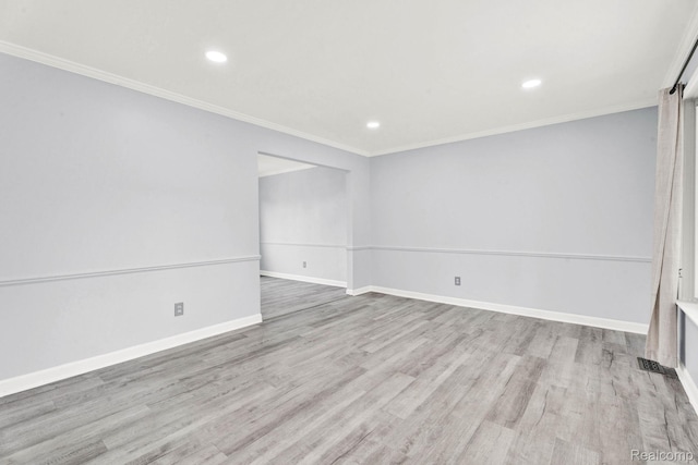 14717 Dane Ct, Sterling Heights, MI 48312 - unfurnished room with wood finished floors, recessed lighting, and crown molding