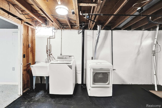 14717 Dane Ct, Sterling Heights, MI 48312 - laundry area featuring washing machine and dryer