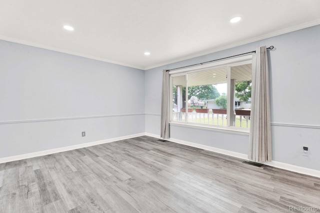 14717 Dane Ct, Sterling Heights, MI 48312 - spare room featuring ornamental molding, wood finished floors, and recessed lighting