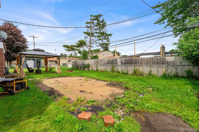 14717 Dane Ct, Sterling Heights, MI 48312 - fenced backyard featuring a gazebo