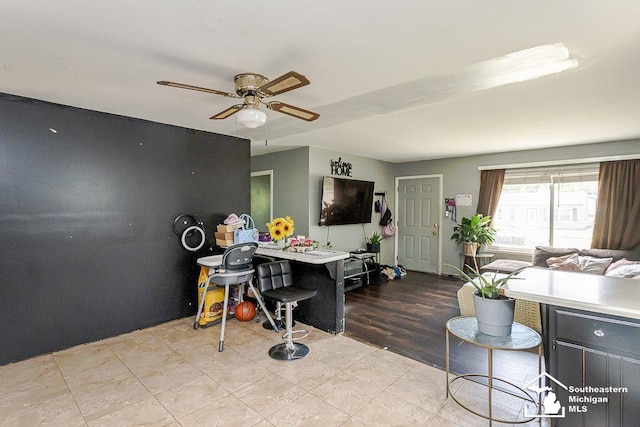 1151 July Dr, Adrian, MI 49221 - kitchen featuring a ceiling fan, light countertops, and open floor plan