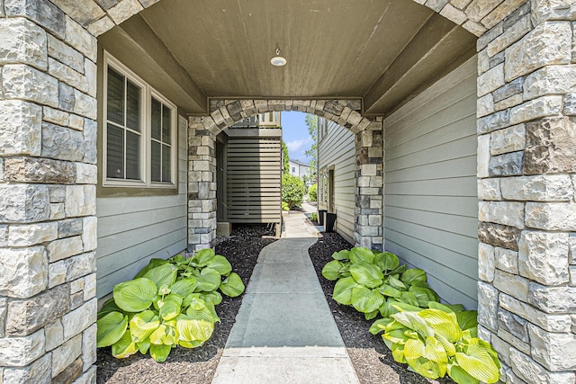 2005 Celadon Dr NE Unit 12, Grand Rapids, MI 49525 - property entrance with stone siding