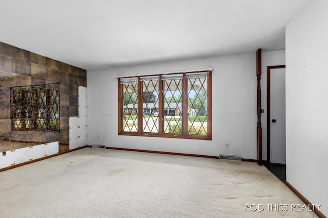 10975 Campanel Dr, Zeeland, MI 49464 - carpeted empty room featuring baseboards
