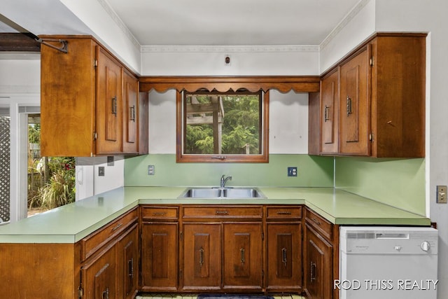 10975 Campanel Dr, Zeeland, MI 49464 - kitchen featuring white dishwasher, light countertops, and a peninsula