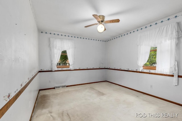 10975 Campanel Dr, Zeeland, MI 49464 - spare room featuring a ceiling fan and carpet