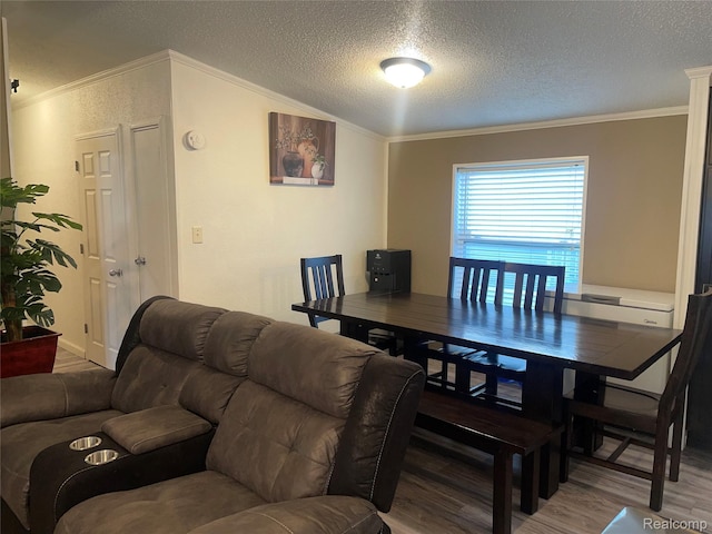 43251 Bonaparte, Sterling Heights, MI 48314 - dining room with crown molding, wood finished floors, and a textured ceiling