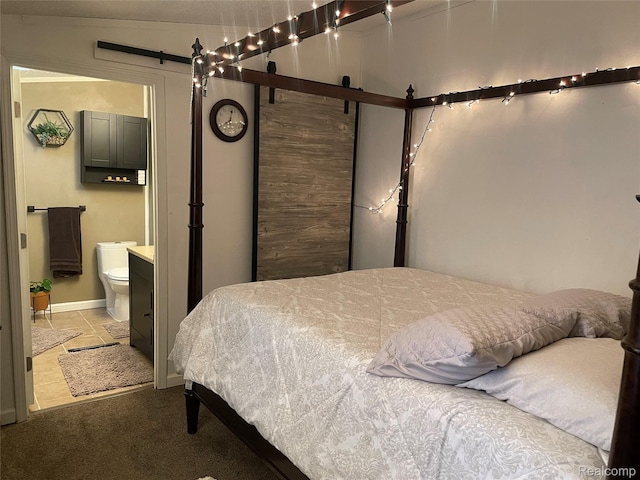 43251 Bonaparte, Sterling Heights, MI 48314 - bedroom featuring a barn door and ensuite bath