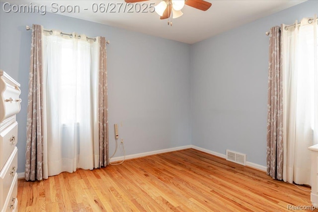 14711 Paris St, Allen Park, MI 48101 - spare room featuring a ceiling fan and light wood-style flooring