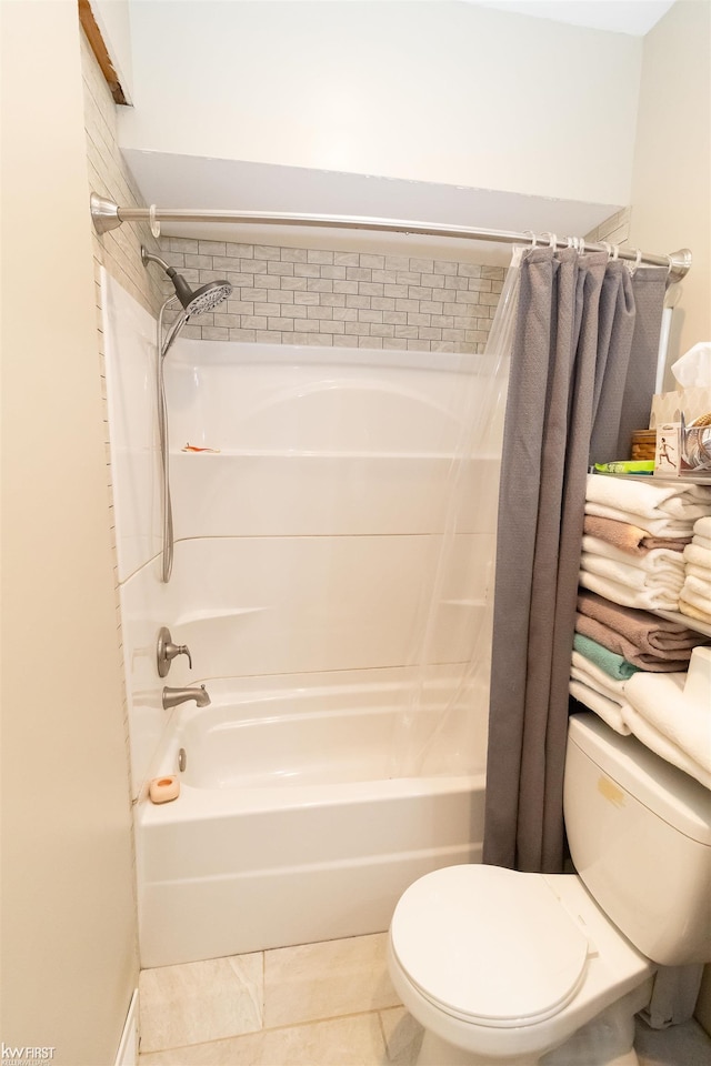 615 Saginaw St, Vassar, MI 48768 - bathroom with shower / bath combo with shower curtain and tile patterned flooring
