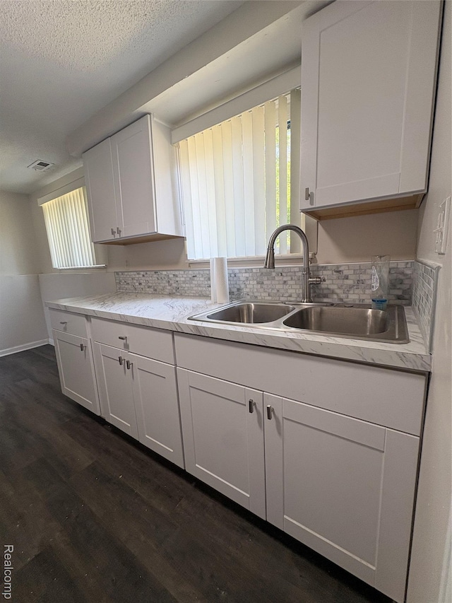 4357 Isabelle St, Inkster, MI 48141 - kitchen featuring white cabinets, dark wood-style floors, and a textured ceiling