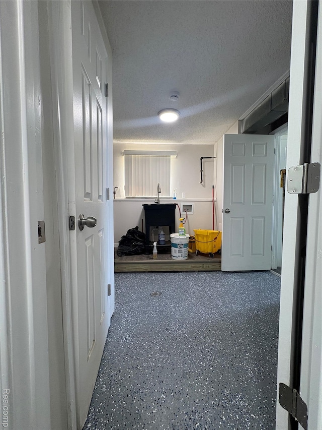 4357 Isabelle St, Inkster, MI 48141 - hallway with speckled floor and a textured ceiling