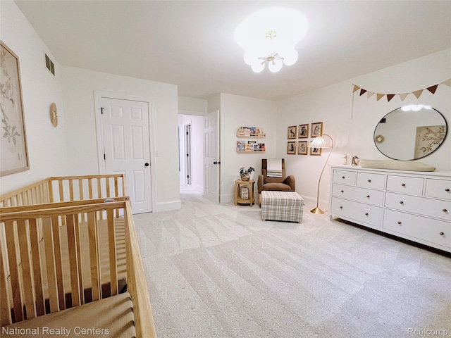 5403 Lenard Cir, Howell, MI 48843 - bedroom featuring light carpet, a nursery area, and a chandelier