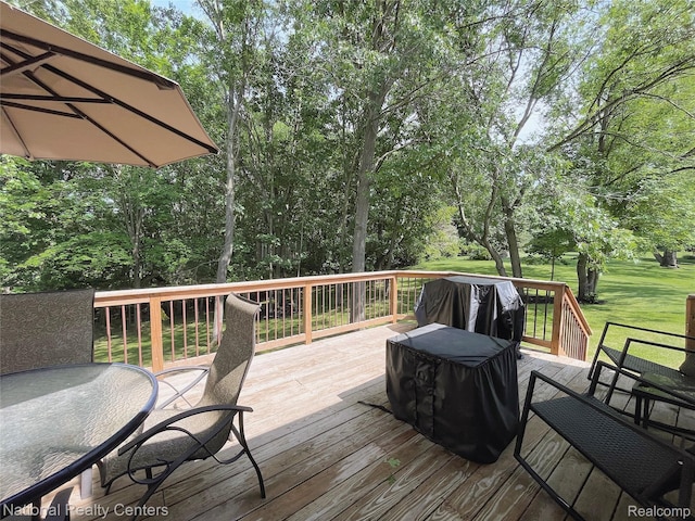 5403 Lenard Cir, Howell, MI 48843 - wooden deck with area for grilling and view of scattered trees