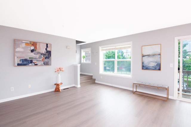 2769 Barclay Way, Ann Arbor, MI 48105 - unfurnished living room with wood finished floors and healthy amount of natural light