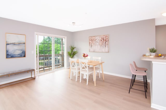 2769 Barclay Way, Ann Arbor, MI 48105 - dining room with light wood-style floors and baseboards