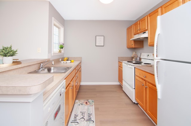 2769 Barclay Way, Ann Arbor, MI 48105 - kitchen featuring white appliances, under cabinet range hood, light countertops, and light wood-style flooring