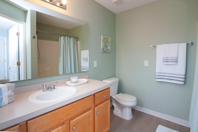 2769 Barclay Way, Ann Arbor, MI 48105 - bathroom with wood finished floors, vanity, and curtained shower
