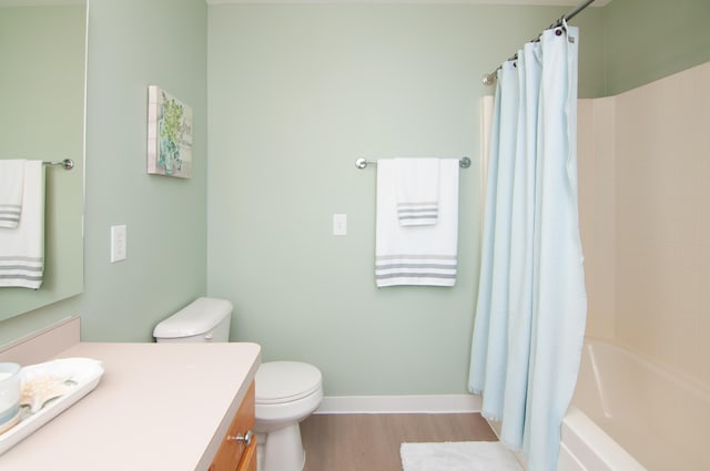 2769 Barclay Way, Ann Arbor, MI 48105 - bathroom with vanity, shower / bath combo with shower curtain, and wood finished floors