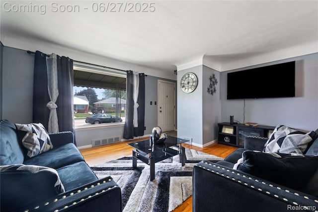 24585 Johnston Ave, Eastpointe, MI 48021 - living room featuring wood finished floors