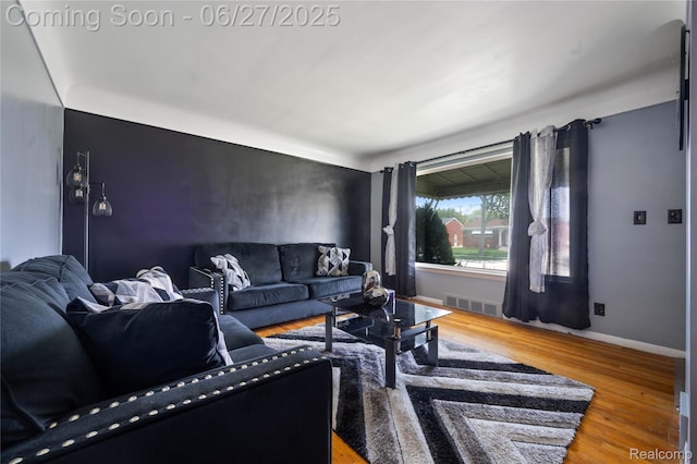 24585 Johnston Ave, Eastpointe, MI 48021 - living area with wood finished floors