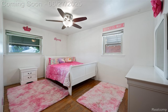 24585 Johnston Ave, Eastpointe, MI 48021 - bedroom with wood finished floors and ceiling fan