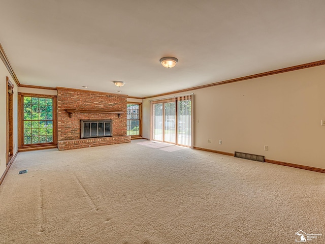 255 Maywood Ave, Monroe, MI 48162 - unfurnished living room with crown molding, carpet flooring, and a brick fireplace