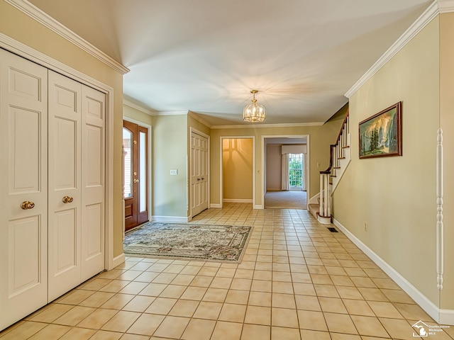 255 Maywood Ave, Monroe, MI 48162 - foyer entrance with a chandelier, light tile patterned floors, stairway, and ornamental molding