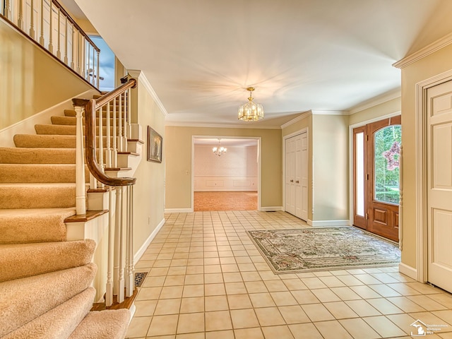 255 Maywood Ave, Monroe, MI 48162 - entrance foyer featuring a chandelier, light tile patterned floors, stairs, and crown molding