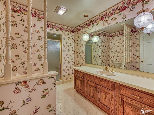 255 Maywood Ave, Monroe, MI 48162 - bathroom featuring vanity, tile patterned flooring, and wallpapered walls