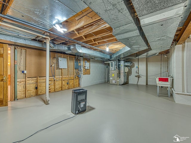 255 Maywood Ave, Monroe, MI 48162 - unfinished basement with heating unit and concrete block wall