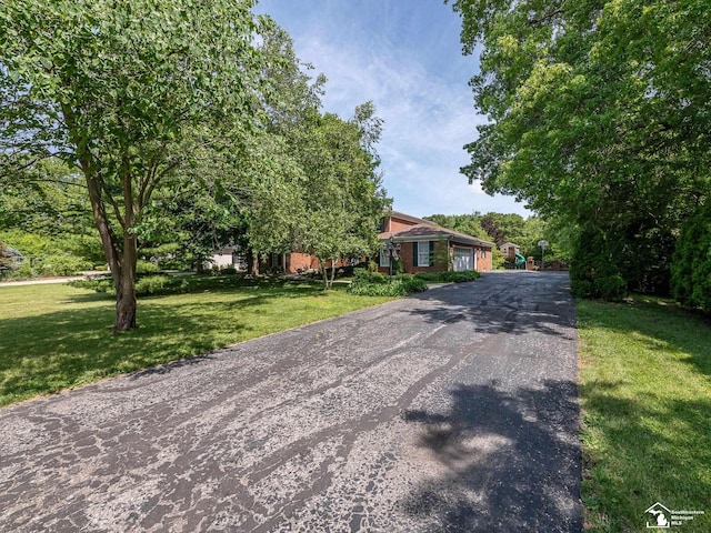 255 Maywood Ave, Monroe, MI 48162 - obstructed view of property with a front yard