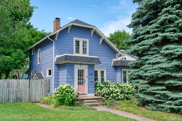 904 Michigan Ave, East Lansing, MI 48823 - view of front of home featuring a chimney and roof with shingles