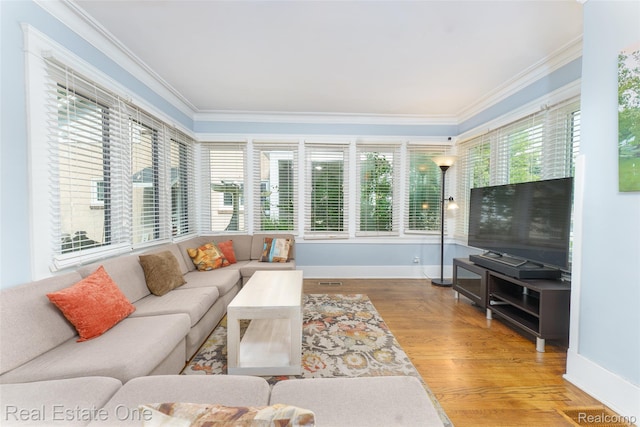 904 Michigan Ave, East Lansing, MI 48823 - living area with crown molding and wood finished floors