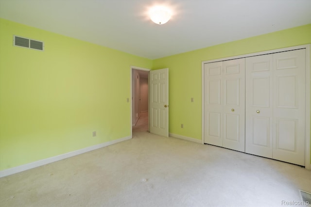 4270 Argenta Dr, Brighton, MI 48116 - unfurnished bedroom featuring carpet floors and a closet