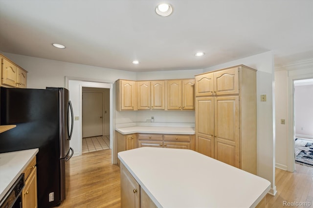 4270 Argenta Dr, Brighton, MI 48116 - kitchen with freestanding refrigerator, light brown cabinets, light countertops, light wood finished floors, and recessed lighting