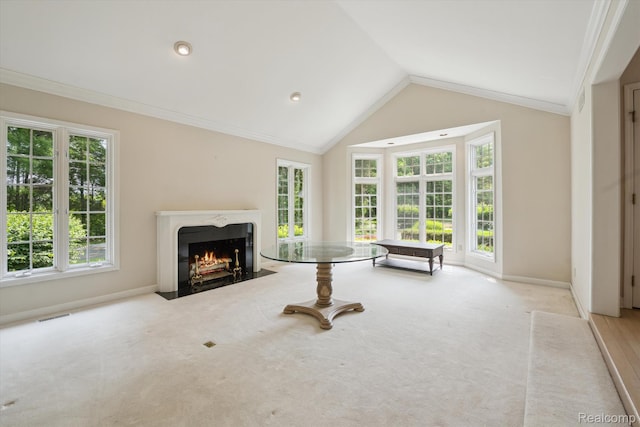4270 Argenta Dr, Brighton, MI 48116 - living area with a premium fireplace, lofted ceiling, ornamental molding, and carpet floors