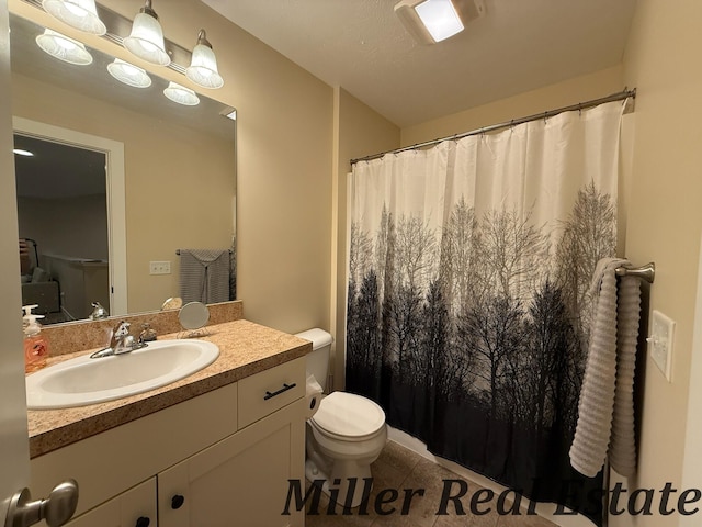 618 Riverwalk St, Hastings, MI 49058 - full bathroom featuring vanity, tile patterned floors, and a shower with shower curtain